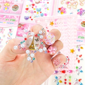 Sparkly heart-shaped diamond sticker featuring an Eiffel Tower design for DIY crafts