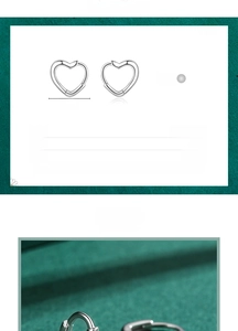 Détail des boucles d'oreilles en forme de cœur en argent 925 avec diamètre de 12mm