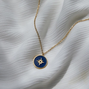 Blue enamel sea compass star pendant necklace in gold plated stainless steel