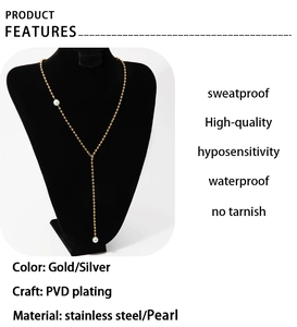 Detail of Y-shaped pearl necklace on mannequin showing PVD gold plated stainless steel