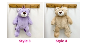 Detail view of purple and khaki teddy bear plush backpacks with adjustable straps