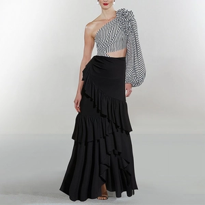 Retro french one-shoulder swimsuit set with striped top and ruffled long black skirt