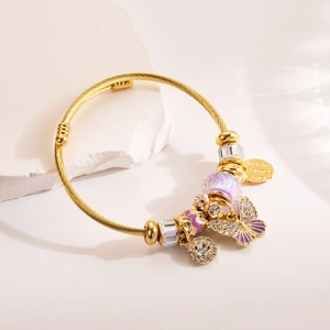 Bracciale a cavo dorato con ciondolo a farfalla viola e perline di cristallo per donna