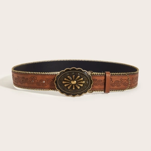 Retro caramel brown leather belt with vintage sunflower metal buckle and embossed patterns
