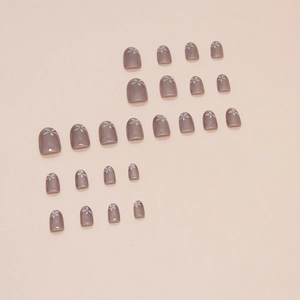 24-piece short round press-on nails in dusty rose with minimalist white floral patterns