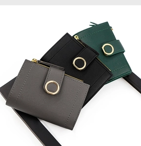 Three compact PU leather wallets in grey, black, and green with golden round buckles