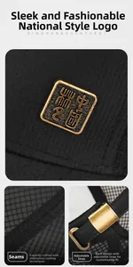 Detail of vintage metal Chinese seal logo and adjustable buckle on black mesh cap
