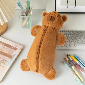 Detailed view of plush capybara pencil case with soft brown fur and smooth zipper closure