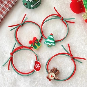 Christmas hair ties set with reindeer, tree, and gift charms on red green elastic cords