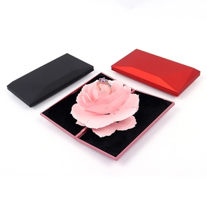 3D pop-up rose jewelry box for rings in black, red, and pink colors on white background