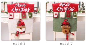 Detail of Christmas chair covers featuring 3D snowman and reindeer plush character designs
