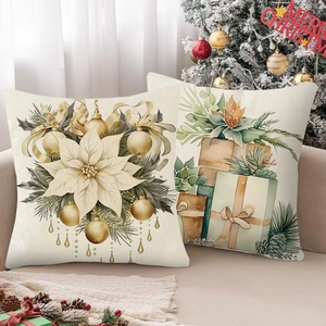 Detailed macro of two Christmas linen pillow covers with watercolor floral and gift prints