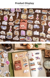 Macro detail of vintage book stickers with watercolor ink pens and classic stationery motifs