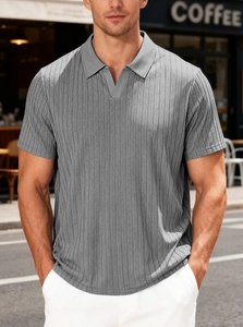 Close-up of gray vertical striped knit polo shirt with textured towel jacquard fabric