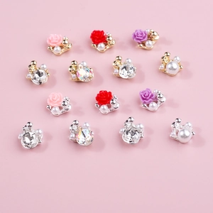 3D camellia resin flower nail charms set with pearls and rhinestones in gold and silver bases