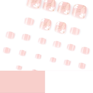 Fresh white petal floral press-on toenails with glitter swirls and pink base
