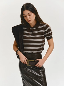 Slim fit brown and white striped knit Polo shirt paired with a dark faux leather midi skirt