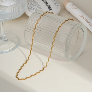 Minimalist gold wavy snake chain necklace for women made of premium stainless steel