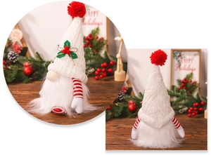 Detail of a Christmas gnome featuring a white knitted hat and festive striped arms decor