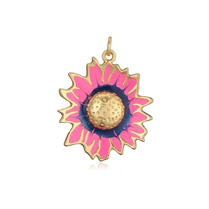 Detailed macro view of colorful enamel sunflower pendant with pink petals and gold trim