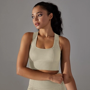 Detailed macro view of seamless knitted sports bra with honeycomb texture and racerback