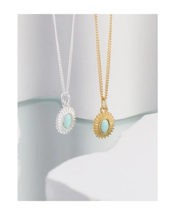 Detailed view of S925 silver and gold opal necklaces with sunburst oval pendants