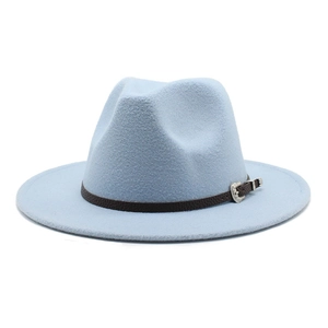 Detail of light blue wool fedora hat with brown leather band and carved silver buckle