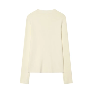 Detail view of cream long sleeve knit sweater showing fine ribbed texture and back design