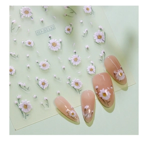 Detailed macro view of 5D white daisy nail art stickers model 5D-ST132 with embossed texture