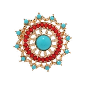 Ethnic bohemian brooch with turquoise gem, golden hollow filigree and red beads