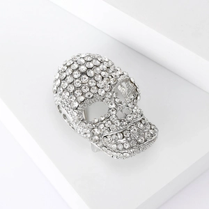Sparkling rhinestone skull brooch in silver alloy finish for suits and accessories