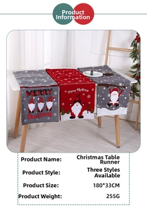 Close-up of knitted Christmas table runner with Santa Claus pattern measuring 180x33cm