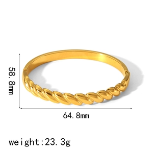 Minimalist gold wavy textured stainless steel bangle bracelet with dimensions 58.8mm x 64.8mm