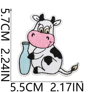 Detailed view showing precise 5.7x5.5cm measurements of the cute cow embroidery patch