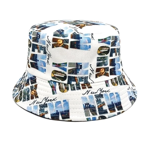 Close-up of white bucket hat featuring colorful New York graffiti print and high-quality canvas