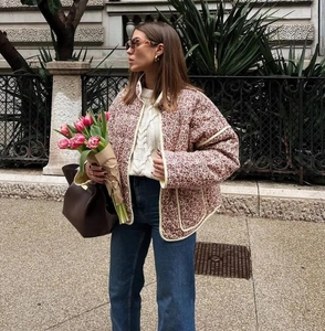 Close-up of a floral quilted cotton jacket with vintage print and loose fit design