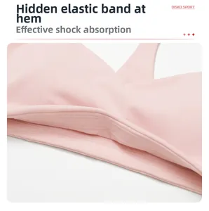 Pink yoga bra detail featuring a hidden elastic waistband for shockproof support