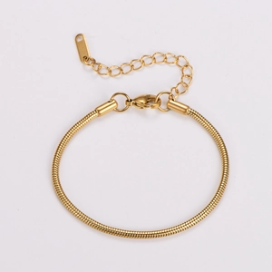 Detailed view of golden stainless steel snake chain with lobster clasp and extender