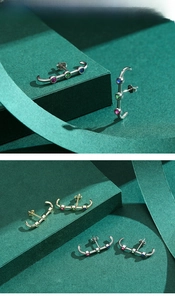 Detailed view of S925 sterling silver ear crawlers with colorful round gemstones