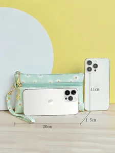 Mint green floral canvas clutch bag with wrist strap fits a 6.5 inch smartphone