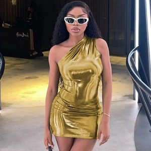 Detail of gold metallic one-shoulder mini dress featuring elegant ruched texture effects
