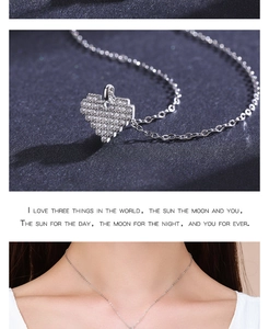 Detail of silver pixel heart necklace with white zircons and a lifestyle wearing shot