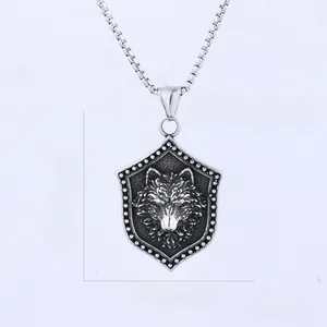 Detailed view of punk wolf head shield pendant with size and weight measurements