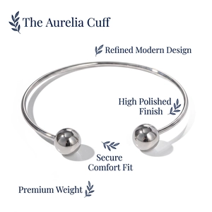 Minimalist open-end stainless steel ball cuff bracelet with a polished silver mirror finish