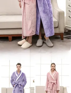 Detail of contrast cuffs and plush flannel texture on unisex long bathrobes
