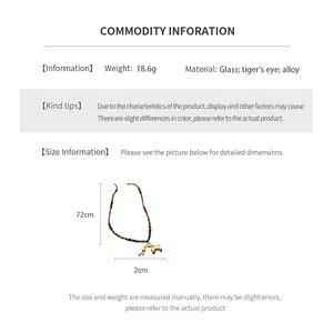 Detail view of the 2cm horse pendant with tiger eye stone on a 72cm long necklace chain