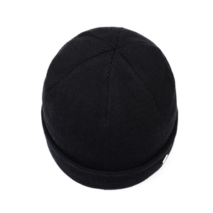 Thick black knit beanie with ribbed texture and folded cuff for winter outdoor warmth