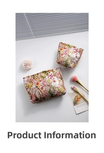 Macro view of floral jacquard fabric texture and brand label on toiletry makeup bag