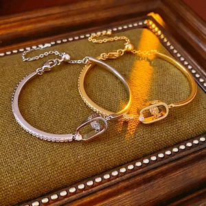 18k gold plated chain bracelet with moving zircon stone in a luxury jewelry box
