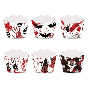 Halloween cupcake liners with bloody pumpkin bat ghost designs on a white background